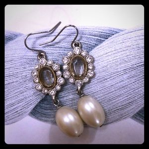 Dangling pearl earrings
